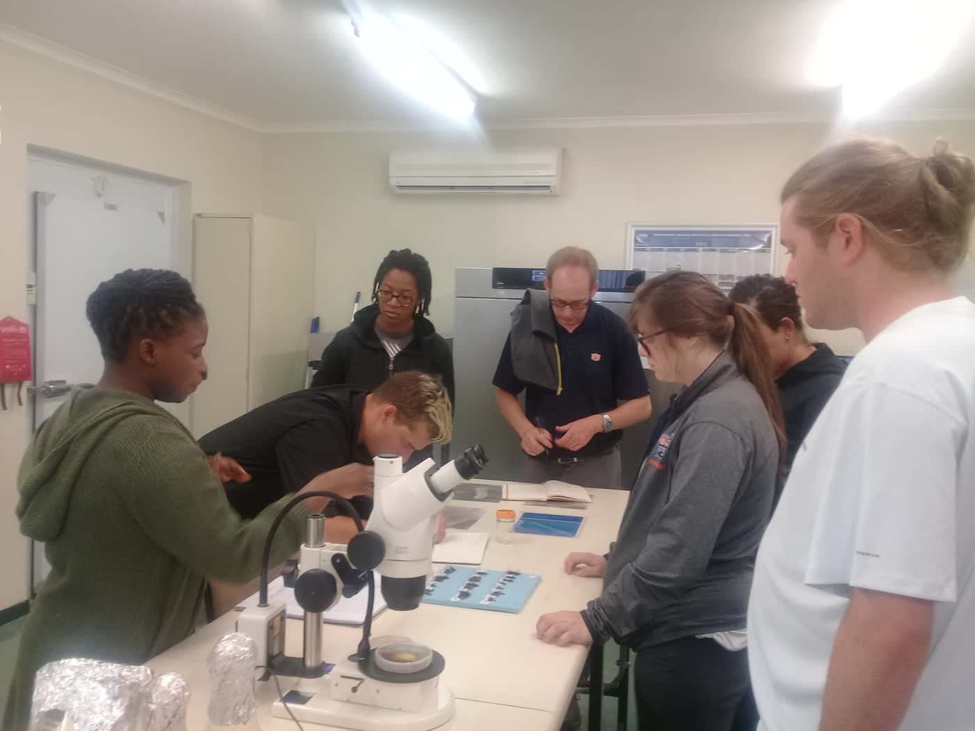 FABI alumnus Ryan Nadel makes a pit stop at FABI with students from Auburn University