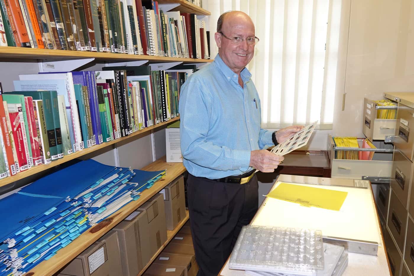 Mike Wingfield starts sorting through the FABI slide collection
