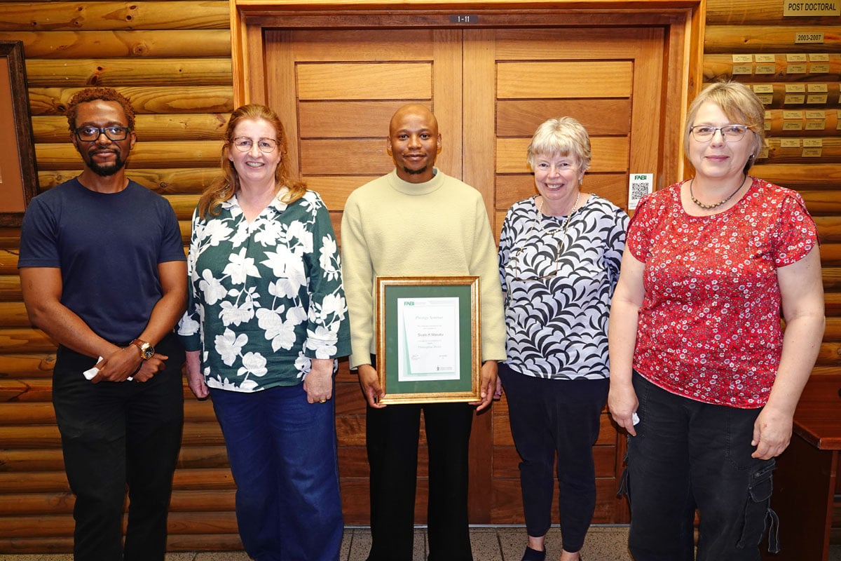 Sicelo Masuku with his PhD supervisors